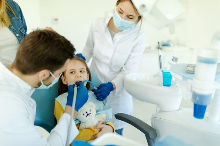 young girl at the dentist