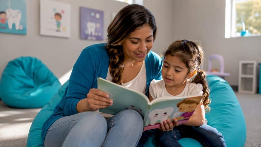 Mother and child reviewing family dentist info